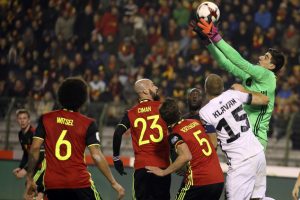 Belgium's goalkeeper Thibault Courtois saves a ball, during the World Cup Group H qualifying soccer match between Belgium and Estonia, at the King Baudouin Stadium in Brussels on Sunday, Nov. 13, 2016. (AP Photo/Olivier Matthys)
